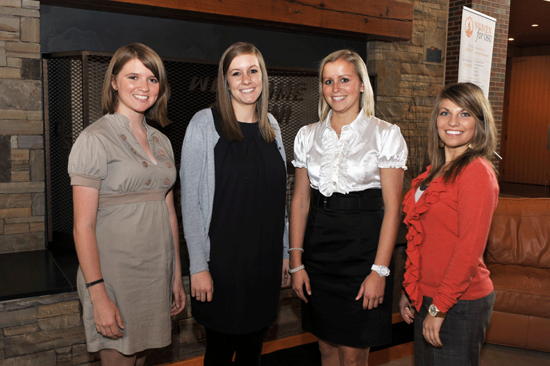 Women for Oklahoma State University honored its Student Philanthropists of the Year (from left) Qualla Parman, Alyssa Peterson, Carly Schnaithman and Haley Baumgardner at its third annual Spring Symposium on April 21. (Photo courtesy of George Bulard.)